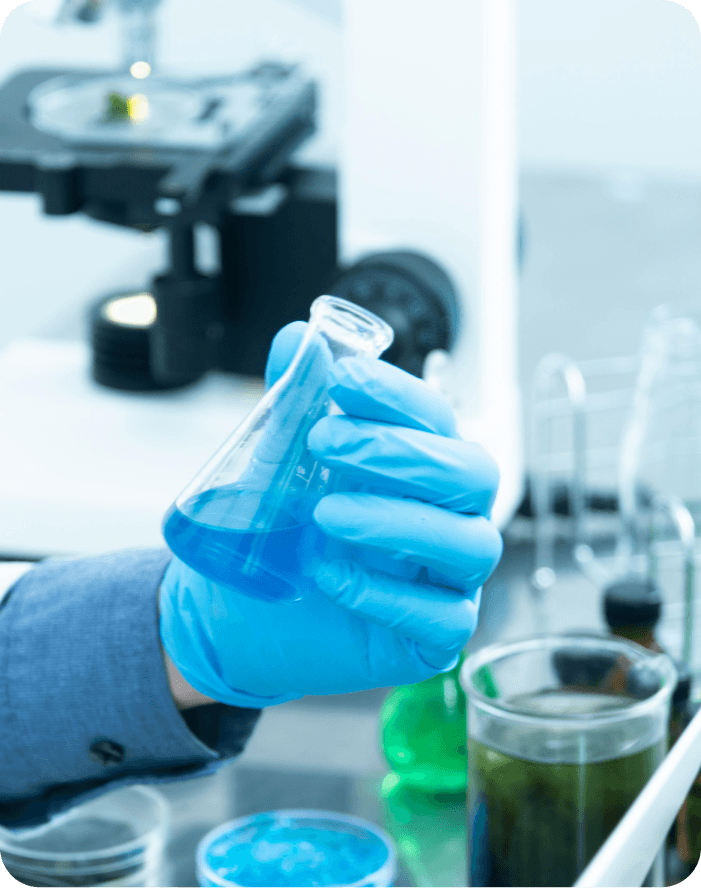 Laboratory scientist with flask